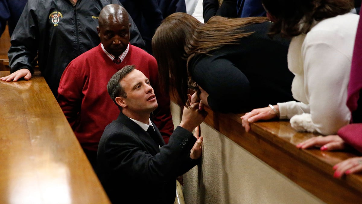 Oscar Pistorius, center leaves the High Court in Pretoria, South Africa, Wednesday, July 6, 2016. (Photo: AP)<b><br></b>