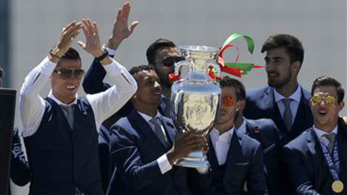 Cristiano Ronaldo and teammates in Lisbon, Portugal with Euro Cup. (Photo: AP)