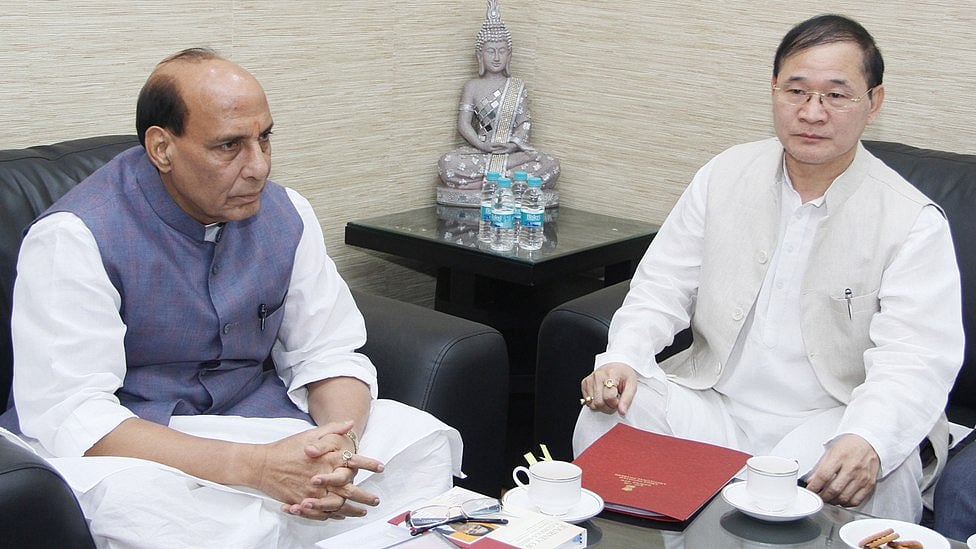 Rajnath Singh (L) and Nabam Tuki (R). (Photo: IANS)
