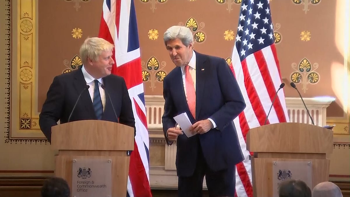 Boris Johnson and John Kerry try to keep things diplomatic at a press conference in London in front of unforgiving reporters. (Photo: AP/UK Pool Screengrab)