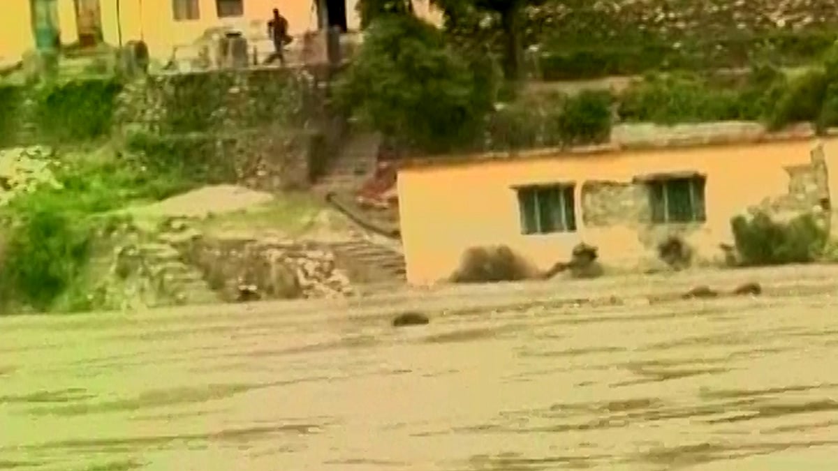 Massive flood in Uttarakhand claims at least 30 lives. (Photo: ANI screengrab)
