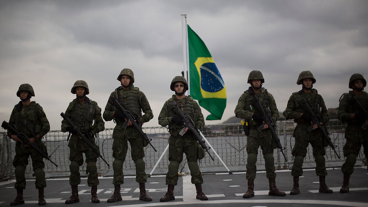 Brazilian marines stand in formation during a training drill simulating a terrorist attack on a ferryboat, ahead of the Olympic Games in Rio de Janeiro, Brazil. (Photo: AP)