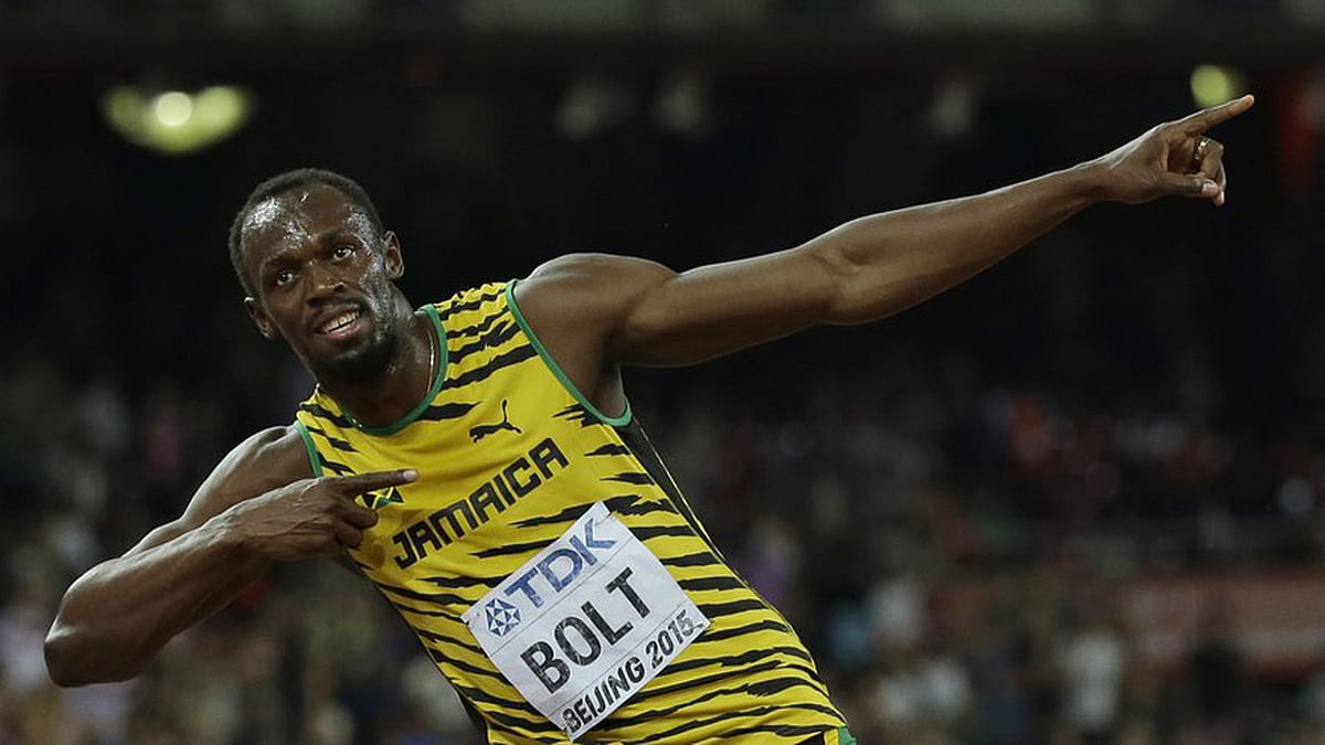 Usain Bolt celebrates after wining the race. (Photo: AP)