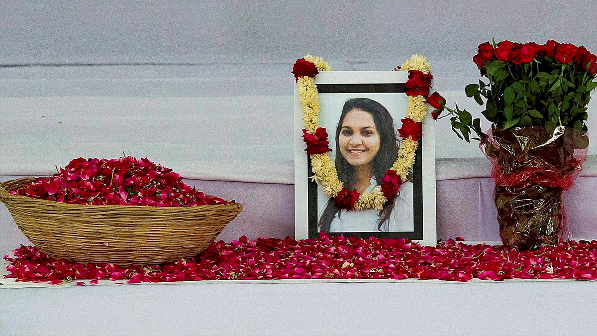 A portrait of Tarishi Jain, a victim of the attack on Dhakas Holey Artisan Bakery, is laid out for people to pay respects during a memorial service before her cremation in Gurugram on Monday. (Photo: PTI)