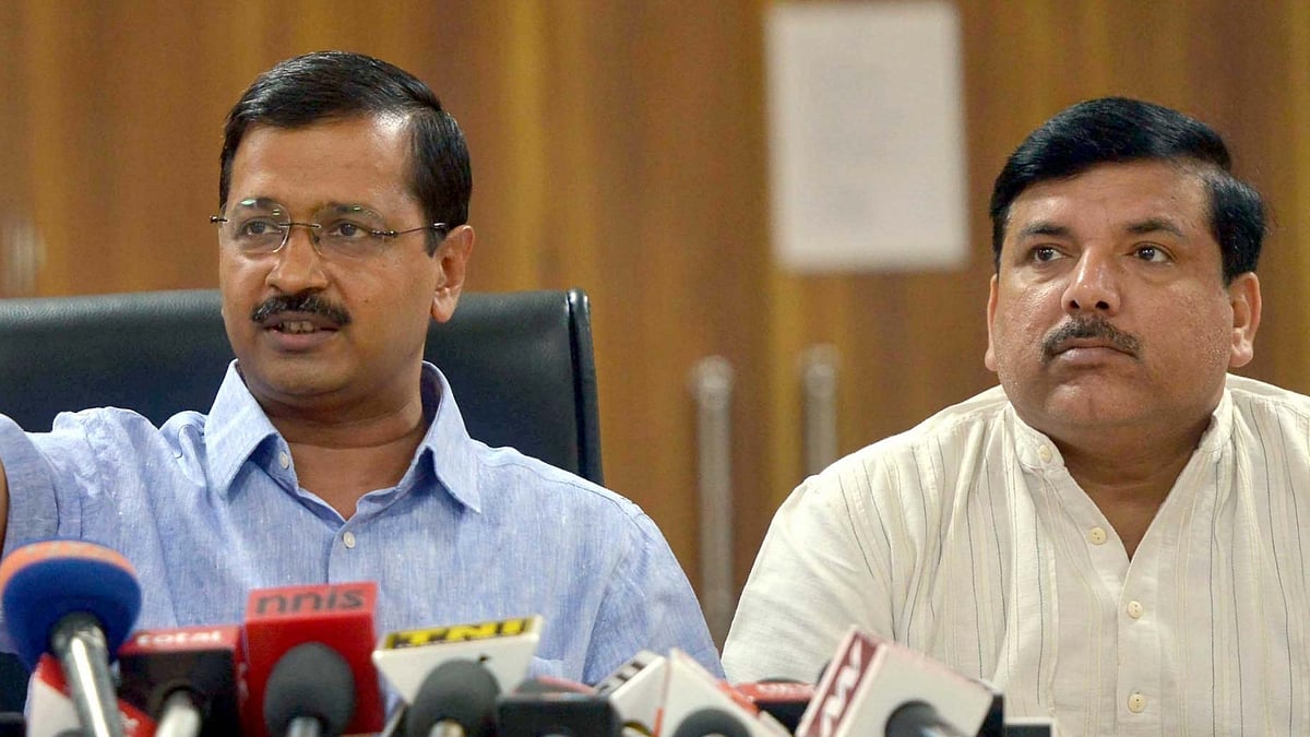File photo of AAP Punjab chief Sanjay Singh (right) with Delhi CM and AAP leader Arvind Kejriwal in Delhi on 5 April 2016. (Photo: IANS)