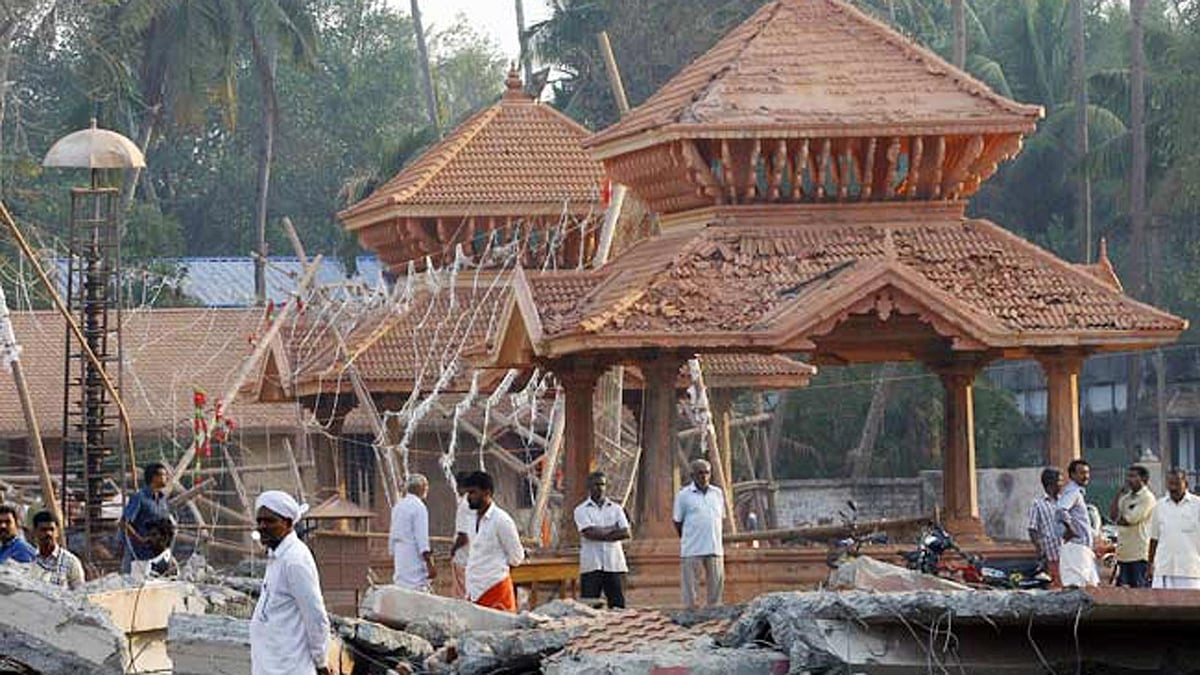 A view of a collapsed building after a massive fire broke out during a fireworks display at the Puttingal temple complex in Kerala, Sunday, 10 April. (Photo: PTI)