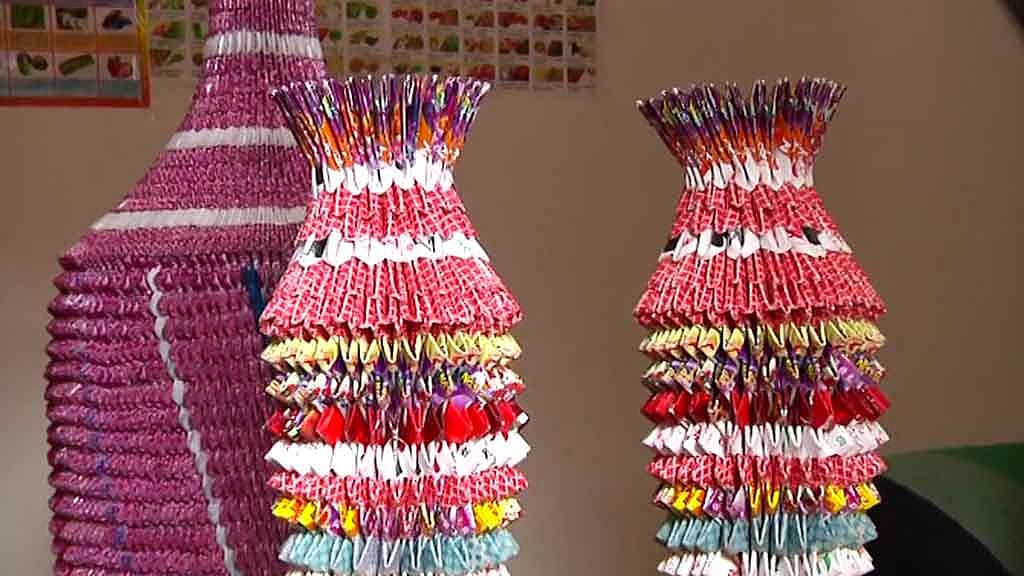 200 decks of poker cards used to make vases. (Photo: AP screengrab)