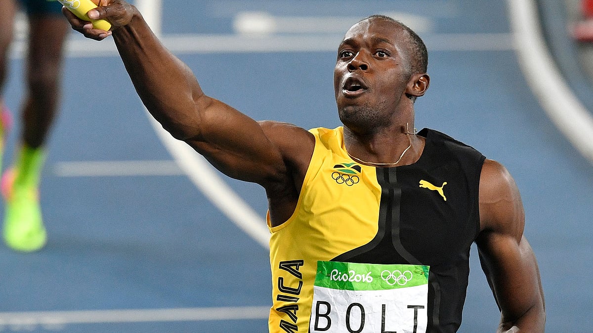 Usain Bolt celebrates after winning his ninth Olympic gold medal. (Photo: AP)