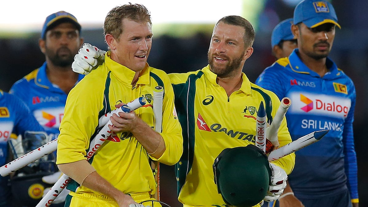 George Bailey and Mathew Wade walks after winning the 4th ODI against Sri Lanka by 6 wickets. (Photo: AP)