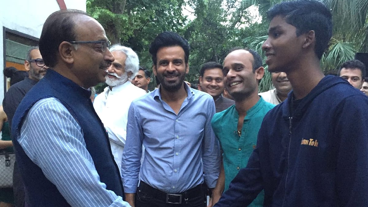 Budhia Singh and Manoj Bajpayee with the sports minister,  Vijay Goel.  (Photo courtesy: Studio Talk PR)