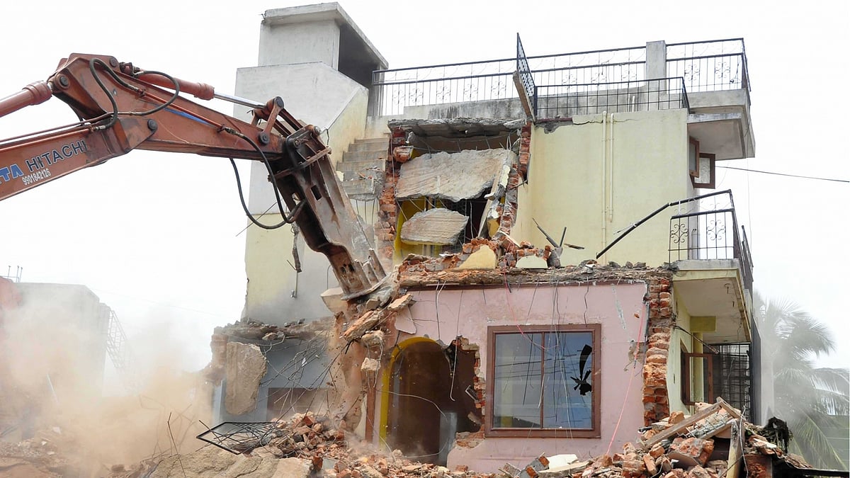 Bruhat Bengaluru Mahanagara Palike (BBMP) officials carry out demolition drive in Bommasandra area of Bengaluru on Thursday. (Photo: IANS)