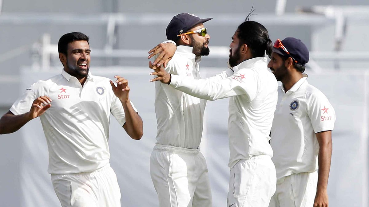 Indian team Celebrates after winning the test match in West Indies. (Photo Courtesy: AP)