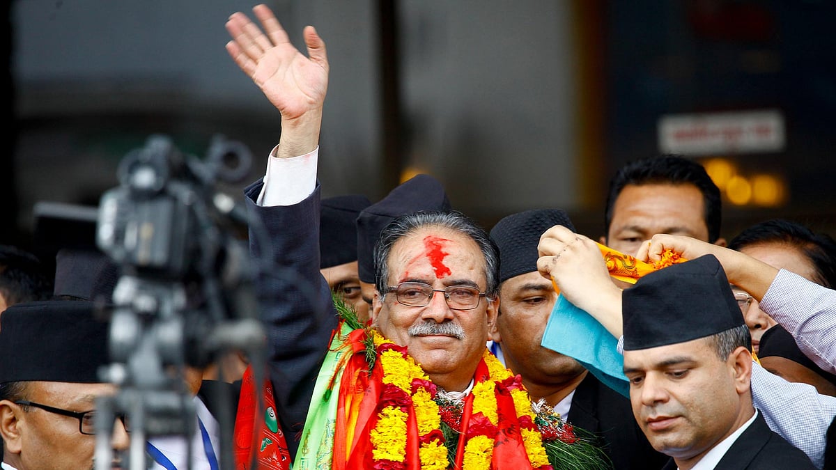Nepal’s newly-appointed prime minister Pushpa Kamal Dahal, waves to the media in Kathmandu, Nepal, Wednesday, on 3 August, 2016. (Photo: AP)