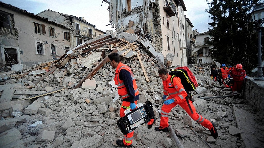 Rescue teams deployed to help thousands of homeless civilians after the buildings collapsed (Photo: AP)