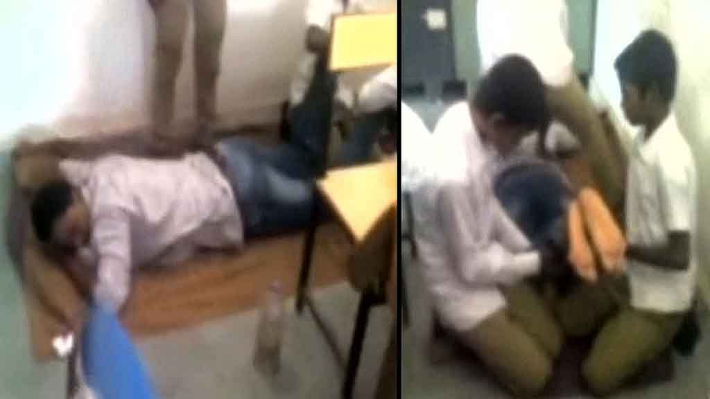 Government school teacher caught on camera getting a foot and back massage from class 10 students. (Photo: ANI screengrab)