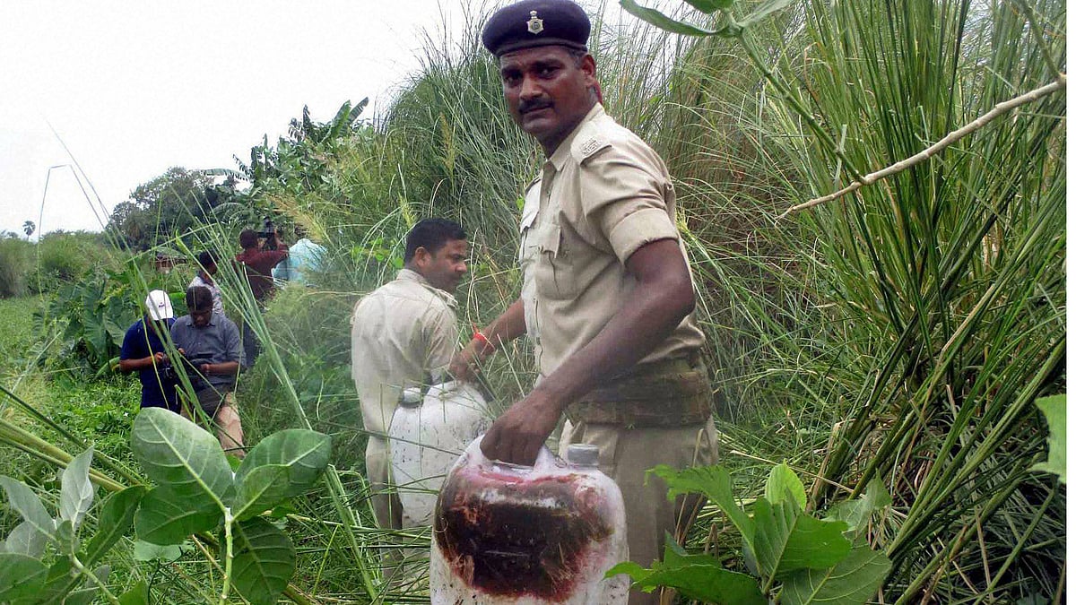 Police recovered poisonous liquor in a field in Khaajurbari Village in Gopalganj district of Bihar. (Photo: PTI)
