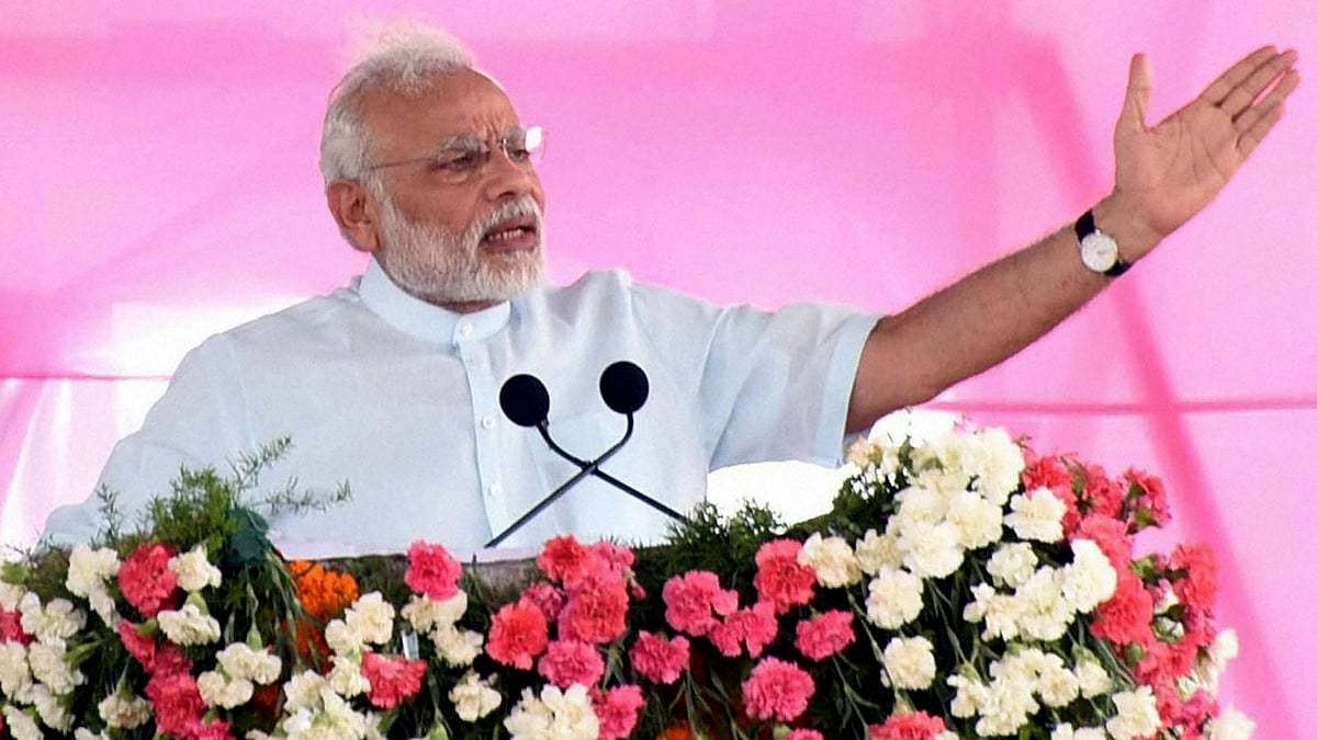 Prime Minister Narendra Modi addressing a public meeting at Gajwel, Medak District, in Telangana on  Sunday. (Photo: PTI)