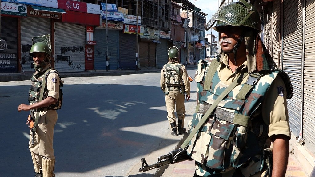 

Soldiers deployed in a Srinagar road   in Kashmir on 12 August 2016. (Photo: IANS)