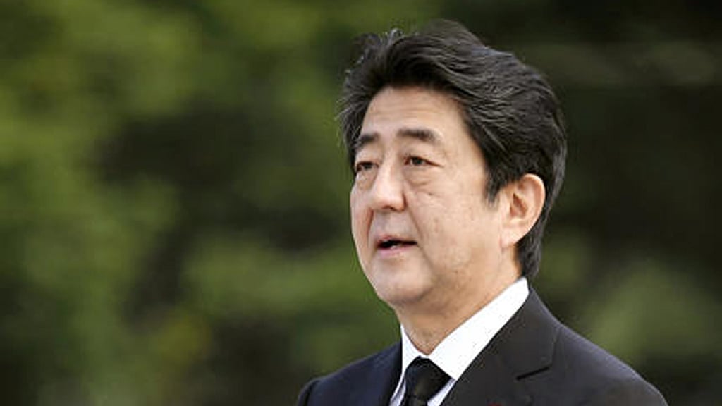 Japanese Prime Minister Shinzo Abe delivers his speech at the Hiroshima Peace Memorial Park during the ceremony to mark the 71st anniversary of the atomic bombing in Hiroshima, western Japan on Saturday, Aug. 6, 2016. (Tsuyoshi Ueda/Kyodo News via AP)