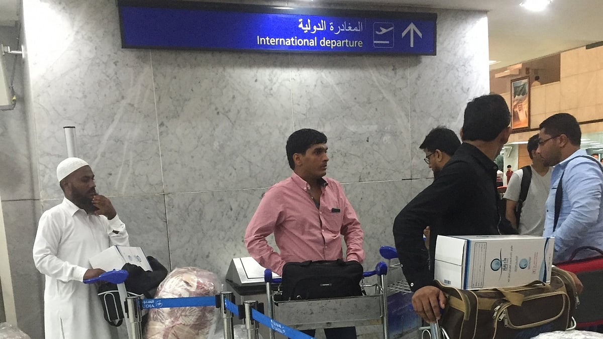 Indian workers at the Jeddah airport in Saudi Arabia on 10 August, 2016. <i>(Photo: IANS)</i>