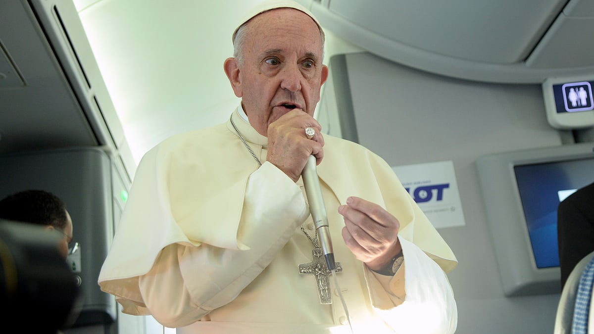  Pope Francis speaks to journalists on board the flight from Poland to Rome, at the end of his 5-day trip to southern Poland, Sunday, 31 July  2016. (Photo: AP)