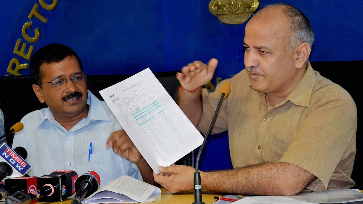 Delhi Chief Minister Arvind Kejriwal with his deputy Manish Sisodia addresses a press conference in New Delhi on Wednesday. (Photo: PTI)