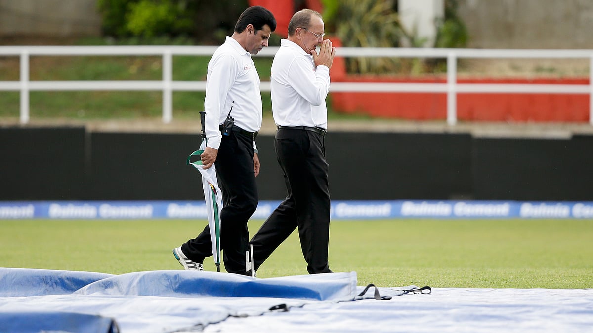 Rain played hide and seek at Sabina Park as West Indies lost four wickets by lunch with only 15.5 overs being bowled. (Photo: AP)