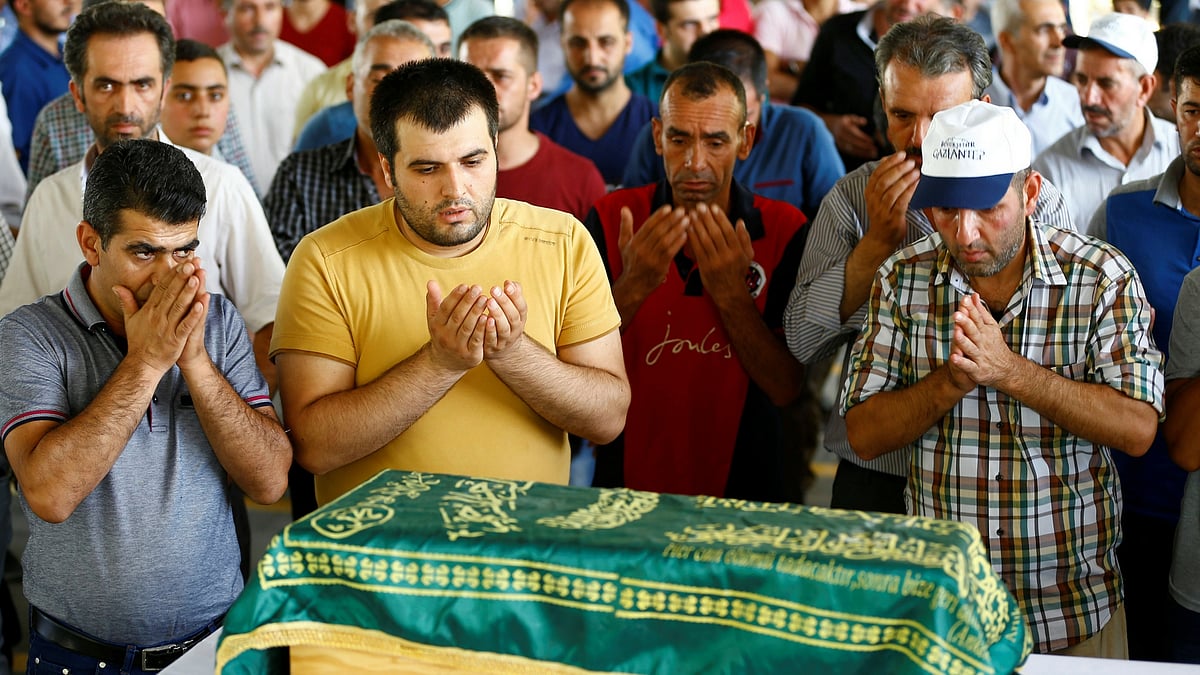 Funeral of a three month old victim who died in the Turkey wedding blast. (Photo: Reuters)