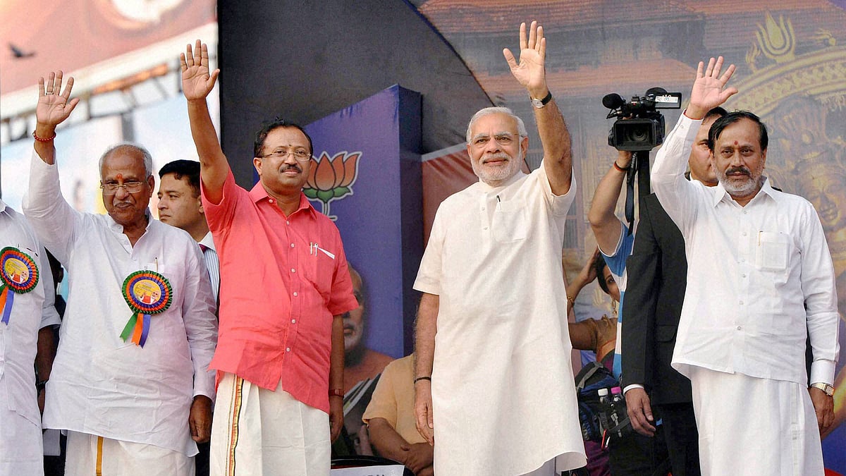 Prime Minister Narendra Modi waves during a public meeting in Thrissur, Kerala on Monday. (Photo: PTI)