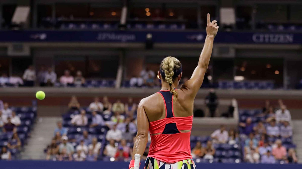 Angelique Kerber, of Germany, reacts after defeating Caroline Wozniacki, of Denmark, during the semifinals of the U.S. Open. (Photo: AP)