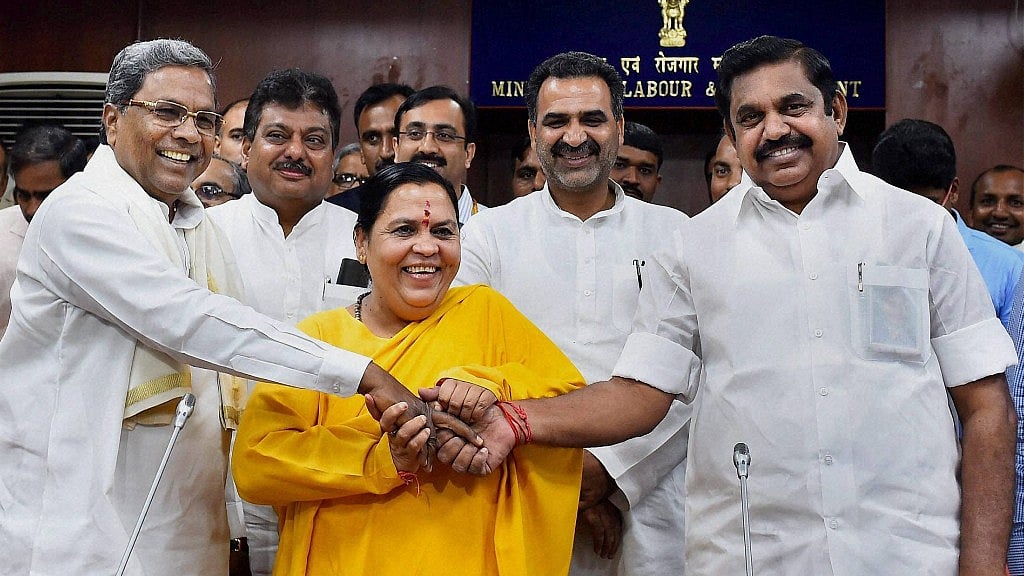 Uma Bharti (centre) during a meeting on Cauvery issue with Siddaramaiah and PWD Minister of Tamil Nadu, Edappadi K Palanisamy, in New Delhi. (Photo: PTI)