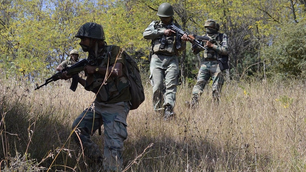 Soldiers in action during an encounter with militants on the Line of Control (LoC) in Uri sector of Jammu & Kashmir on 21 September 2016. (Photo: IANS)