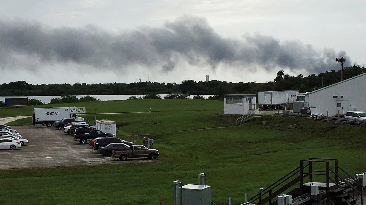 Smoke rises from a SpaceX launch site Thursday, 1 Sept 2016, at Cape Canaveral, Fla. NASA said SpaceX was conducting a test firing of its unmanned rocket when a blast occurred. (Photo: AP)