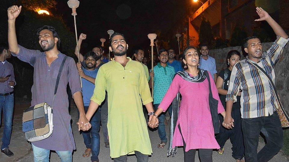 Torchlight procession being led by students belonging to the Students’ Federation of India, 5 September 2016. (Photo Courtesy: SFI JNU/<a href="https://www.facebook.com/sfijnuunit/photos/?tab=album&album_id=1213047132050755">Facebook</a>)