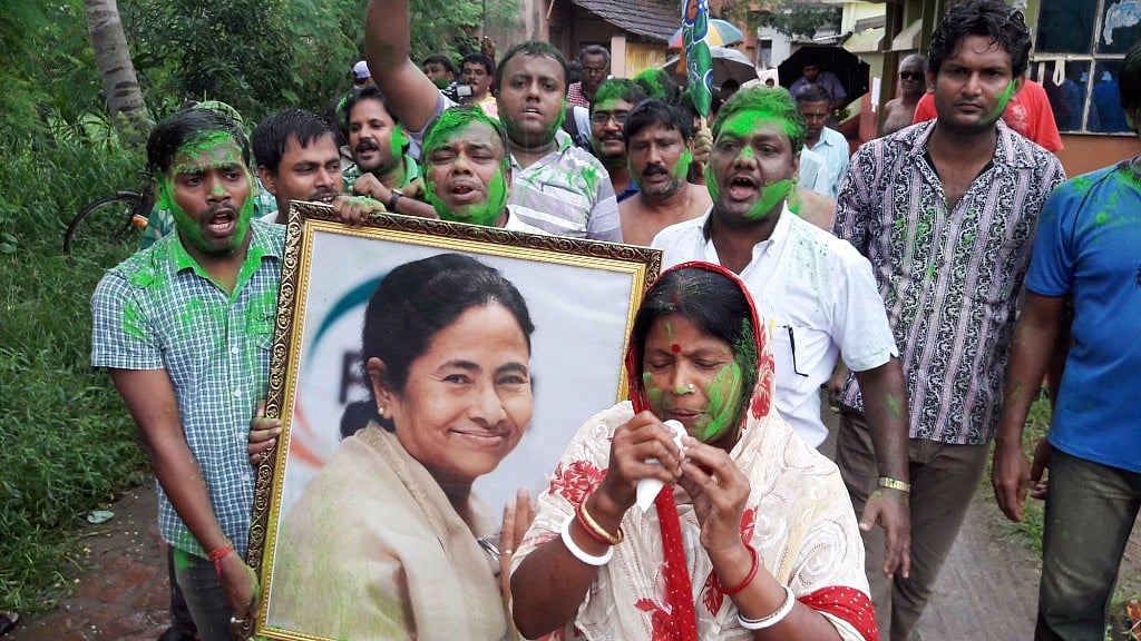 People celebrate after the Supreme Court set aside the land acquisition by the previous Left Front government for the Tatas’ Nano car plant in Singur, Hooghly district, 31 August 2016. (Photo: IANS)