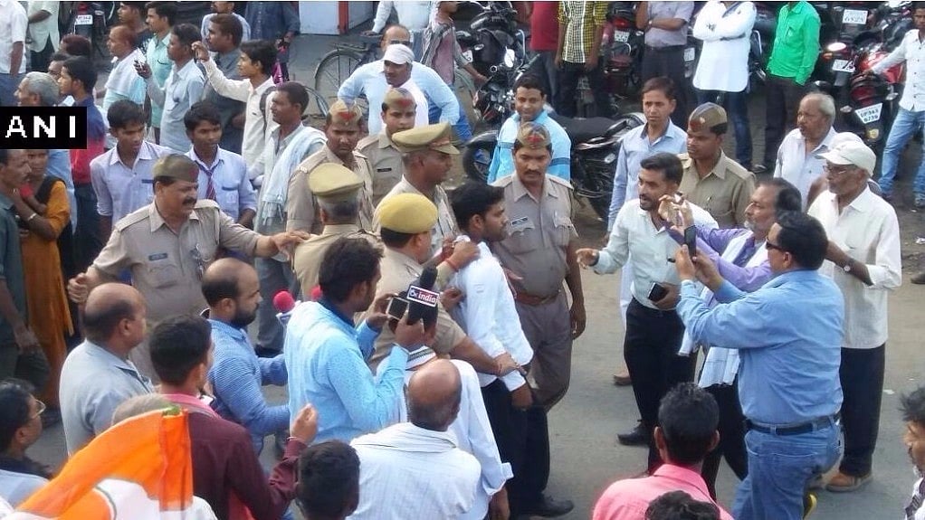 Man arrested for throwing a shoe at Rahul Gandhi in Sitapur. (Photo Courtesy: ANI)