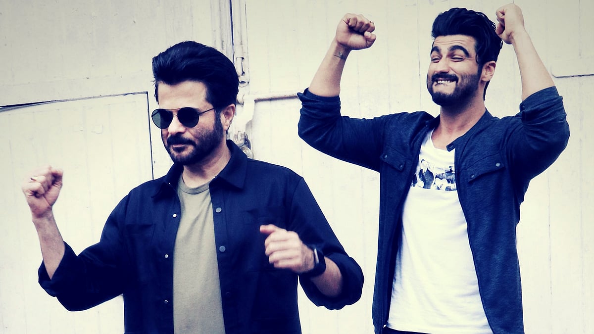 Arjun Kapoor photobombs Anil Kapoor. (Photo: Yogen Shah)