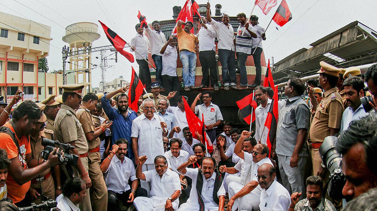 MDMK chief Vaiko, CPM leader G Ramakrishnan and others stage a rail roko at the Central Railway station demanding the constitution of a Cauvery management board, in Chennai on Monday. (Photo: PTI)