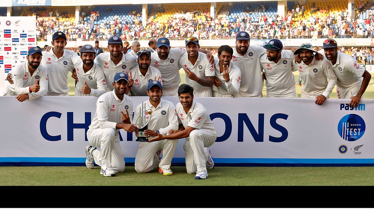 India’s players pose with the trophy after winning the test series. (Photo: Reuters)