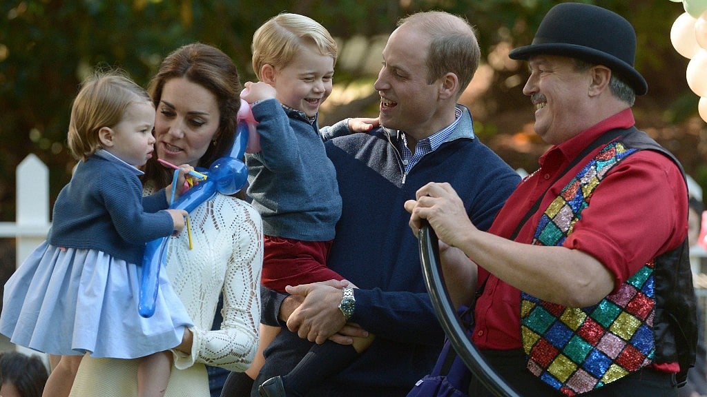 Prince George and Princess Charlotte enjoy their time in the playground in Canada. (Photo Courtesy: AP)