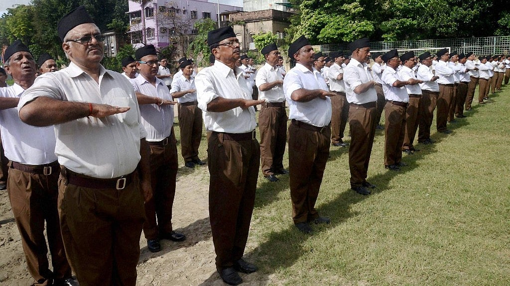 RSS volunteers participate at a special parade in Kolkata. (Photo: PTI)