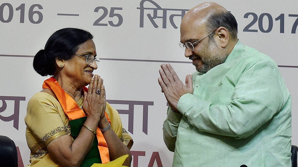 Senior Congress member Rita Bahuguna Joshi with BJP President Amit Shah on Thursday, 19 October 2016. (Photo: PTI)
