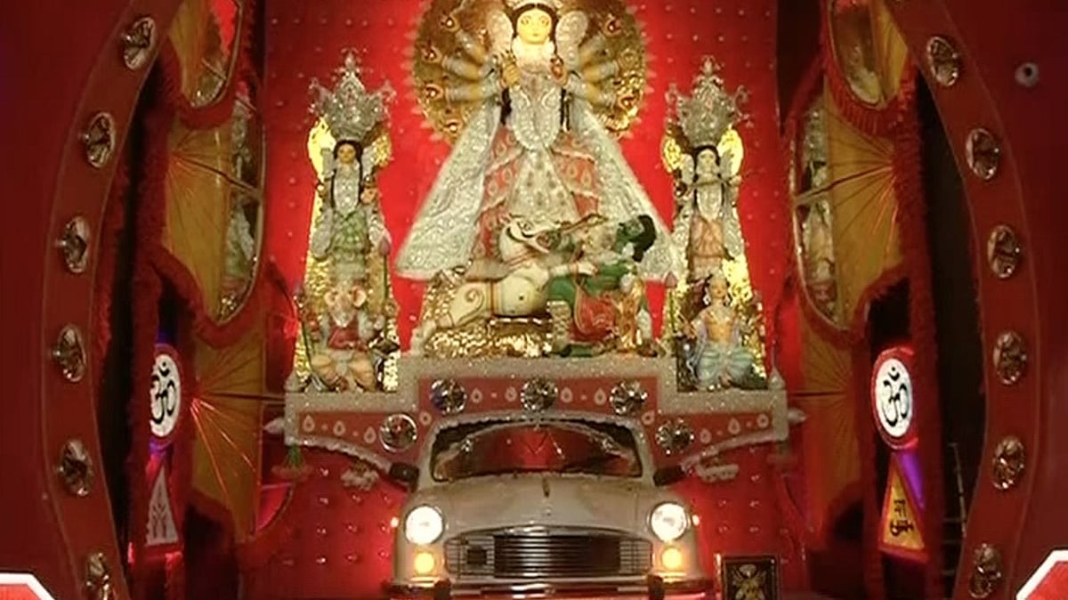 The Beliaghata 33 Palli club has dedicated their Durga Puja Pandal to the iconic Ambassador taxis. (Photo: ANI screengrab)