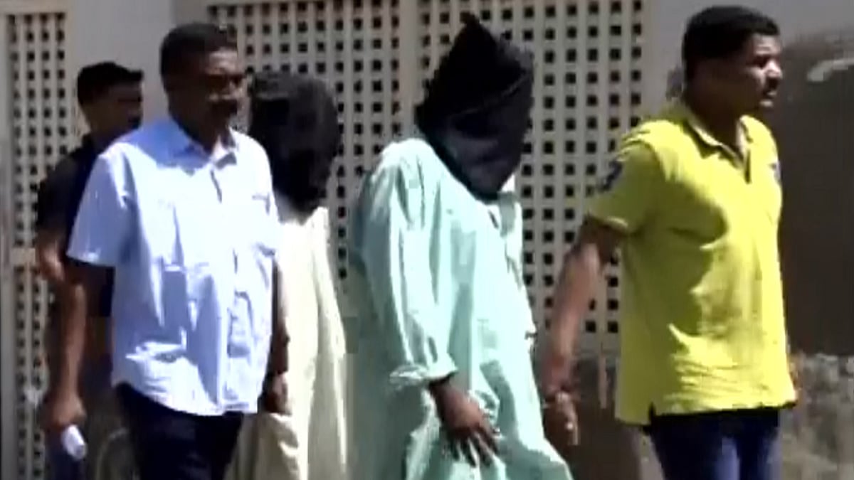 Suspected ISI agents Alana Hamir Sama and his associate Shakur Sumra being presented in Bhuj taluka of the district in Gujarat on Thursday. (Photo: ANI screengrab)