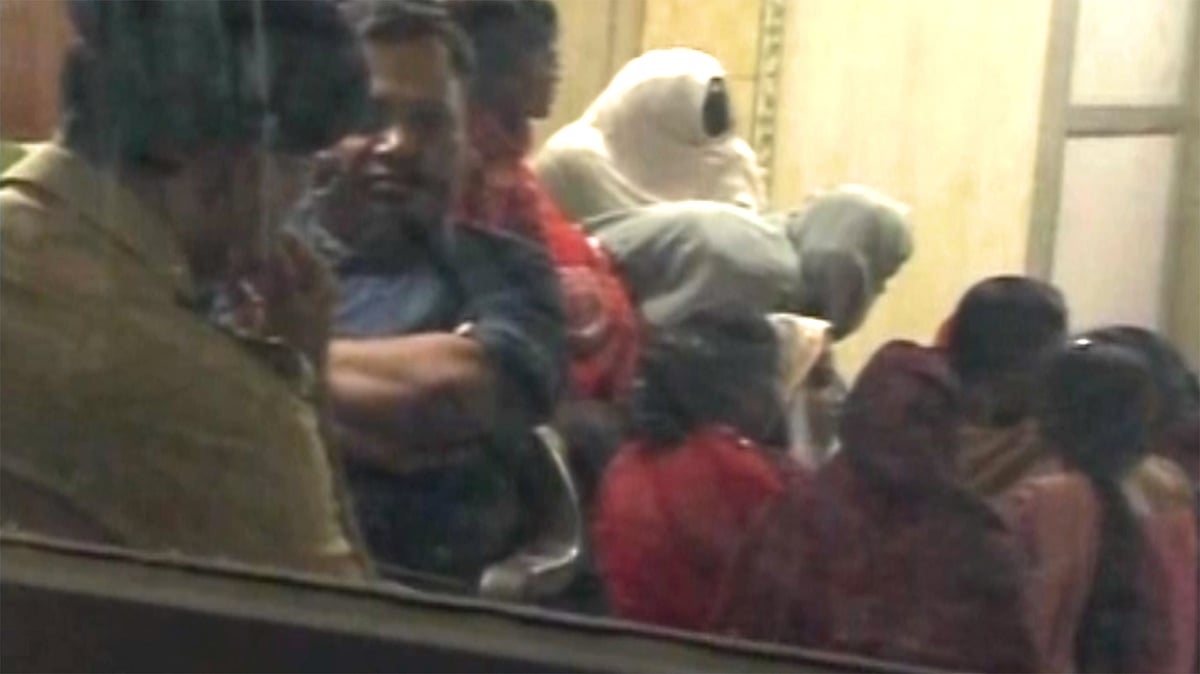 Railway police guard rescued women at Tundla station on Thursday. (Photo: ANI Screengrab)