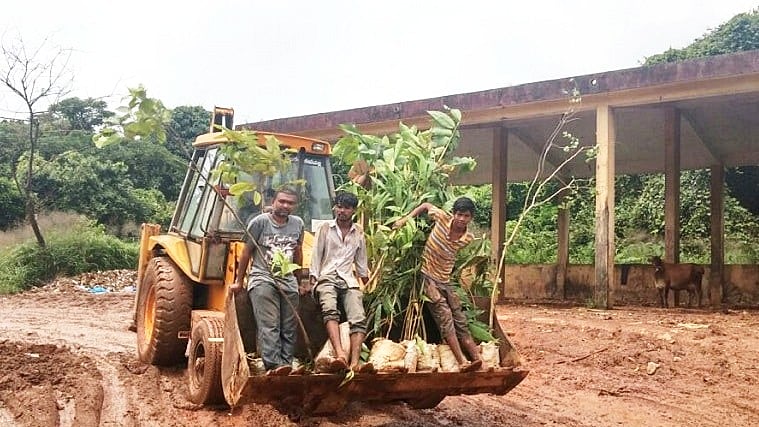 Jeeth Milan Roche has taken on the task of transforming the area, and making living in the vicinity of the landfill bearable. (Photo: The News Minute)