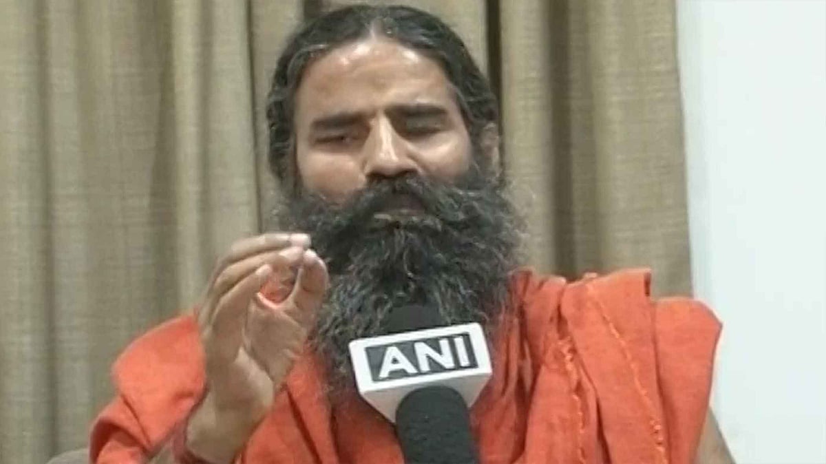 Baba Ramdev congratulates PM Modi on the decision to scrap Rs 500 and Rs 100 notes. (ANI Screegrab)