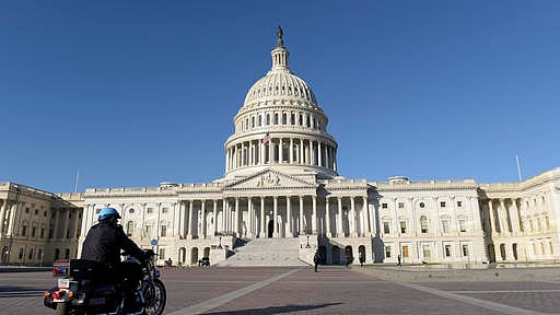 A Capitol Hill police officer drives on the East Front of the Capitol Hill in Washington.