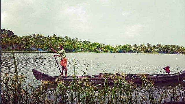 Residents using boats as in the Munroe island of Kerala. (Photo: AP)