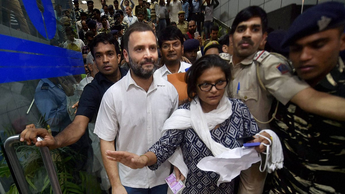 Congress Vice President Rahul Gandhi steps into SBI’s Parliament Street branch on Friday. (Photo Courtesy: PTI)